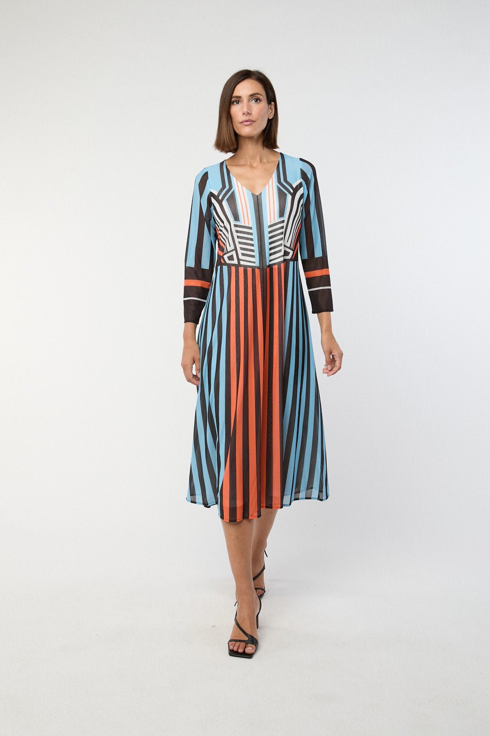 VESTIDO Y BUZOS - Mercedes de Miguel