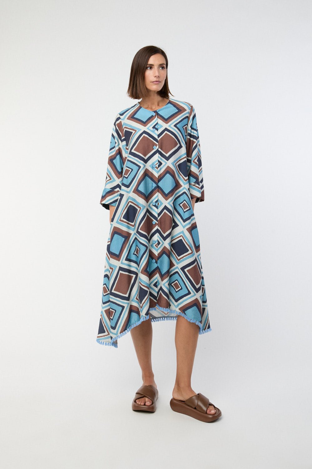 VESTIDO Y BUZOS - Mercedes de Miguel